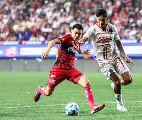Chivas vino de atrás y rescató un punto del campo de Xolos (Getty Images) Chivas vino de atrás y rescató un punto del campo de Xolos (Getty Images)