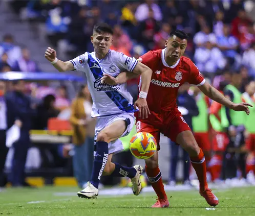 Puebla vs Toluca. (Photo by Agustin Cuevas/Getty Images) Puebla vs Toluca. (Photo by Agustin Cuevas/Getty Images)